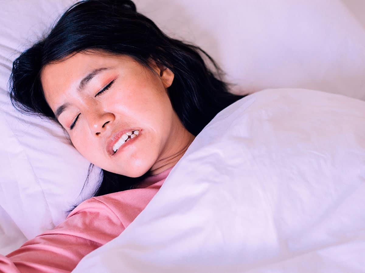 Woman Grinding Her Teeth While Sleeping In New York